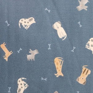 Small  Puppies and Bones on Blue/Orion Cotton Fabric from Dear Stella. Quilting/Craft/Apparel/Home Decor Fabric.