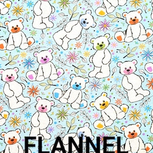 May include: Light blue flannel fabric with a repeating pattern of white teddy bears with colorful accents. The bears have different colored noses, ears, and paws. The fabric also features flowers and the word "FLANNEL".