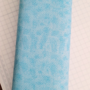FLANNEL: Mottled Baby Blue with Tiny White dots Comfy FLANNEL from A. E. Nathan. Quilting/Craft/Kids/Baby FLANNEL.