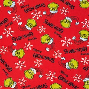 May include: Red fabric featuring a repeating pattern of the Grinch's face in a Santa hat, white snowflakes, and the text "Merry Grinchmas" in black. The fabric is suitable for holiday-themed crafts and apparel.
