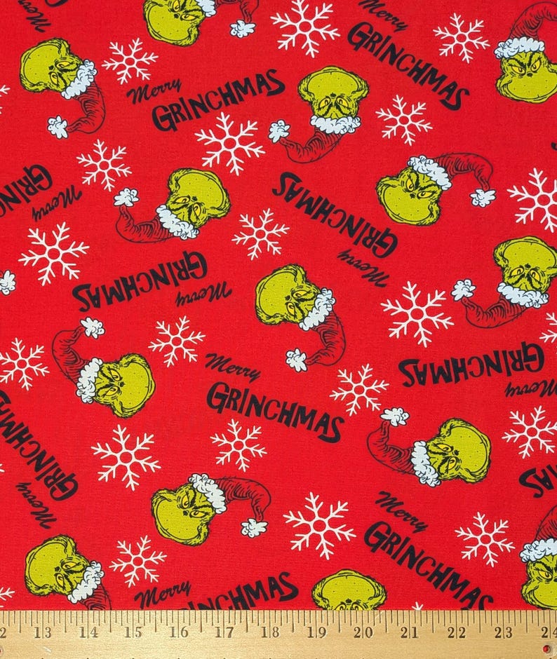 May include: Red fabric featuring a repeating pattern of the Grinch's face in a Santa hat, white snowflakes, and the text "Merry Grinchmas" in black. The fabric is suitable for holiday-themed crafts and apparel.