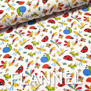 May include: White flannel fabric with a colorful pattern of cartoon insects, including ladybugs, bees, dragonflies, and snails. The word "FLANNEL" is printed in white across the fabric.