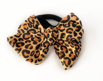 Leopard Print Bow- Baby bow, baby headband, animal print, black nylon, handmade, small bow, infant, boutique