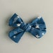 see more listings in the Bows on clips section