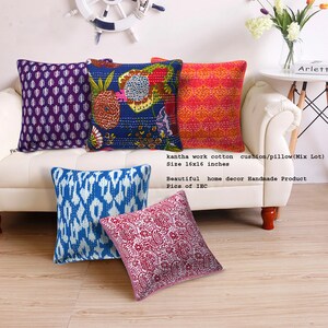 May include: Five colorful cotton cushion covers with kantha embroidery. The covers feature different patterns, including floral, paisley, and geometric designs. The covers are 16 inches by 16 inches.