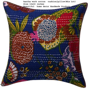 May include: A blue cotton cushion cover with a floral pattern in shades of red, yellow, pink, and brown. The cover is 16 inches by 16 inches and is handmade.
