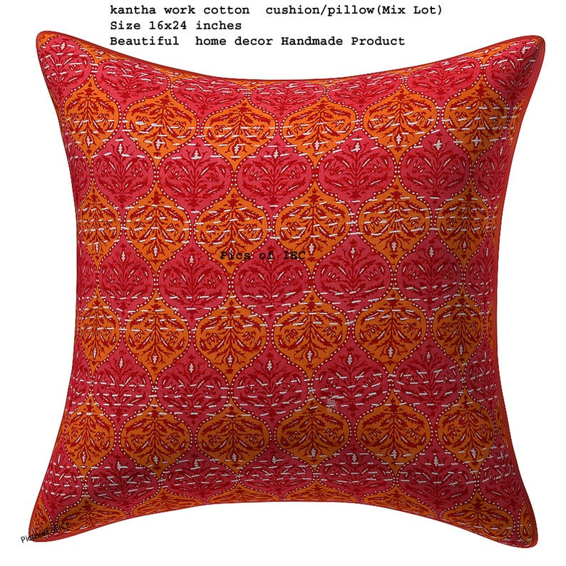 May include: Red and orange cotton cushion cover with a traditional kantha embroidery pattern. The cushion is 16 inches by 24 inches.