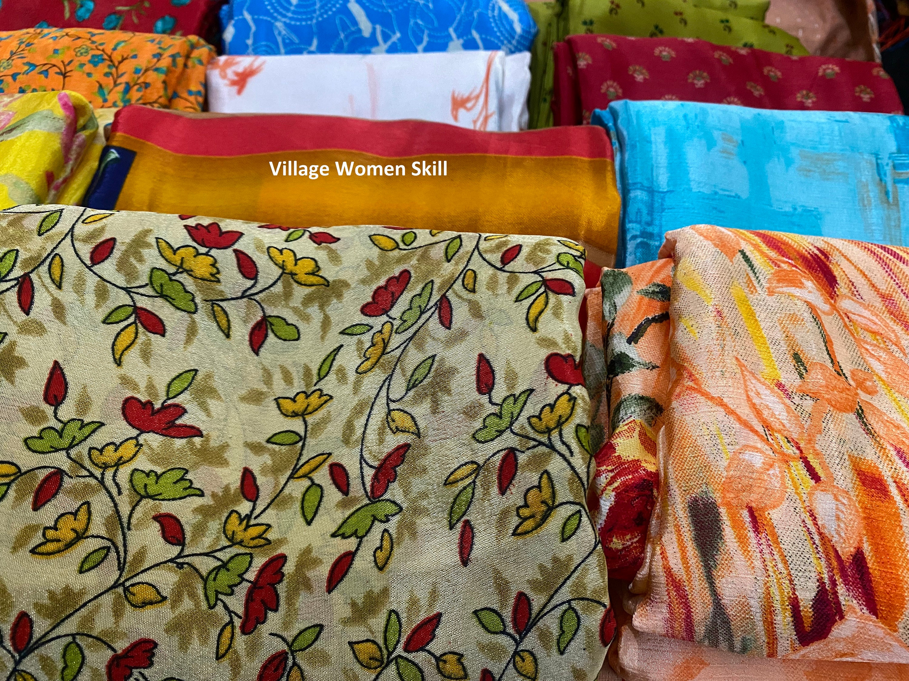 Meet Mini, our vintage sari supplier