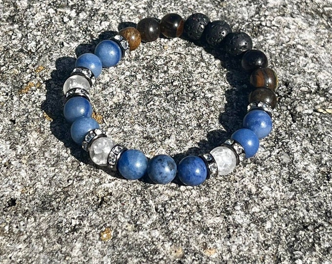 Strength and Discipline 7 Chakra Bracelet with Tiger Eye, Lava Rocks, Dumorterite, and Matte Crystal Quartz for Men and Women