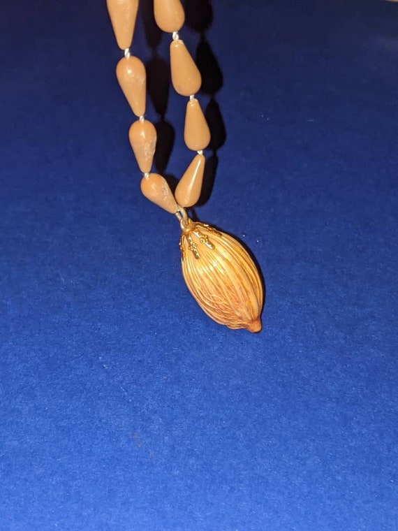 Genuine handcrafted horseradish necklace. Gem