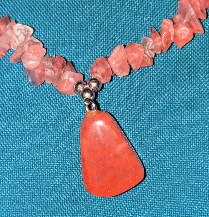 Vintage polished Rose Quartz necklace with pendant.