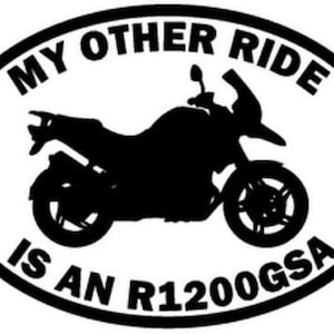 May include: Black and white oval sticker with the text "My Other Ride Is An R1200GSA" and a silhouette of a motorcycle.