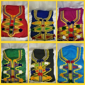 May include: Six different embroidered tops with colorful geometric patterns and pom-poms. The tops are in red, blue, pink, green, black, and light blue.