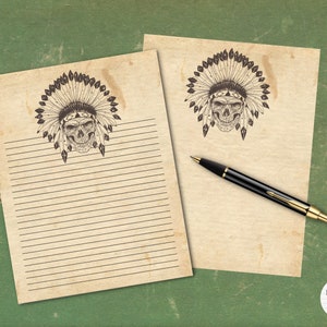May include: A printable sheet of lined paper with a vintage aesthetic. The paper features a black and white illustration of a skull wearing a Native American headdress.
