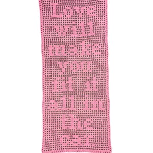 May include: A rectangular, pink crocheted piece with the words "I LOVE YOU" spelled out in a repeating pattern. The open weave design allows the background to show through. The edges are neatly finished.