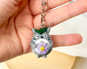 Handmade Totoro Keychain – Polymer Clay Ghibli Keyring with Purple Flower & Leaf Hat | Stainless-Steel Hardware