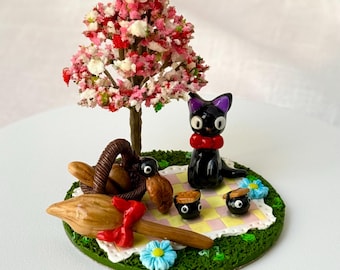 Handgemaakte Jiji-picknick polymeerklei miniatuur met roetsprites