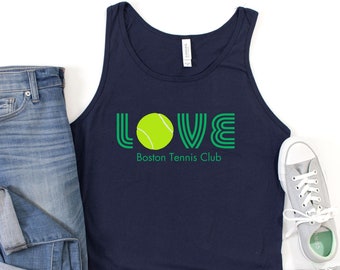 May include: A navy blue tank top with a green and white graphic that says "LOVE" with a tennis ball in the "O". The text "Boston Tennis Club" is below the graphic.