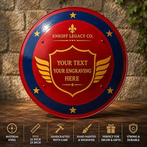 May include: A round red and blue metal shield featuring a central gold crest with wings and the text KNIGHT LEGACY CO. and YOUR TEXT YOUR ENGRAVING HERE. The shield includes gold stars and is available in 22 inch and 24 inch sizes as indicated.