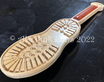 The Boot Print Paddle