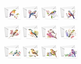 May include: Set of 12 blank greeting cards featuring watercolor illustrations of colorful birds perched on branches with pink and purple flowers.