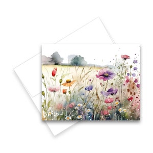 Pode incluir: Pintura em aquarela de um campo de flores silvestres em tons de rosa, roxo, laranja e vermelho. As flores est&atilde;o em um campo com grama alta e uma paisagem distante.