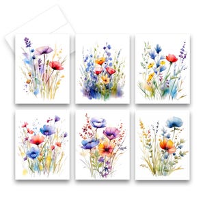 May include: Set of six watercolor greeting cards featuring vibrant floral designs. Each card showcases a unique arrangement of colorful wildflowers, including red poppies, purple lavender, and bluebells, with a white envelope in the background.