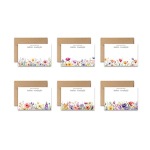 May include: Six blank note cards with brown envelopes. Each card features a watercolor illustration of a border of colorful wildflowers. The text "Just a note from Andrea Manchester" is printed on each card.