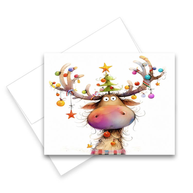 May include: A whimsical Christmas card featuring a cartoon reindeer with large eyes and a colorful nose. The reindeer's antlers are adorned with ornaments, a star, and a small Christmas tree. The reindeer is wearing a plaid scarf.