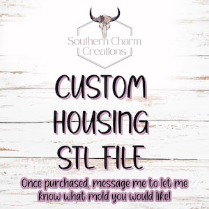 May include: White wooden background with the text "CUSTOM HOUSING STL FILE" in large black letters. The Southern Charm Creations logo is at the top, featuring a skull with horns and flowers.