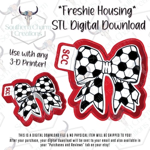 May include: Digital download of a soccer ball bow design. The bow is black and white with a red border. The text reads "Freshie Housing" and "STL Digital Download". The design is intended for use with a 3-D printer.