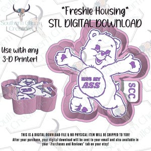 May include: A light purple 3D printer file design for a bear-shaped freshie housing. The design features a bear with the text KISS MY ASS on its belly and SCC on a side tab. Text includes Freshie Housing STL DIGITAL DOWNLOAD and Use with any 3-D Printer.