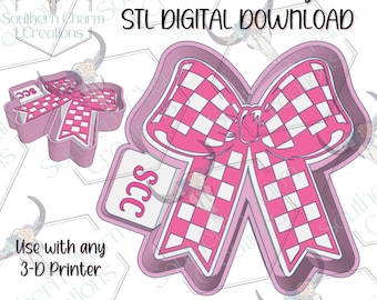 May include: Pink and white checkered bow-shaped STL digital download for 3D printing. The design includes a bow with a checkered pattern and a tag with the letters "SCC". The text "Freshie Housing" and "STL DIGITAL DOWNLOAD" are also visible.
