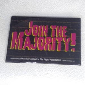 May include: A black and yellow square magnet with the text "Join the Majority!" in pink and yellow letters. The magnet is sponsored by BACCHUS Canada & The Pepsi Foundation.