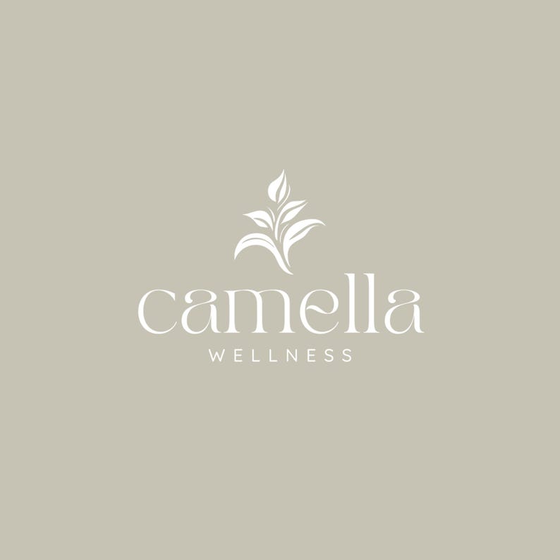Professional logo design on a business card mockup, perfect for yoga studios, spas, and wellness brands.