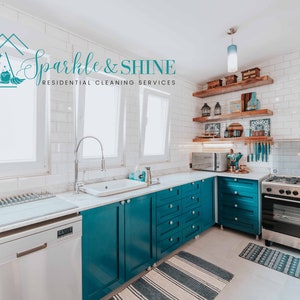 May include: A teal blue kitchen with white subway tile backsplash, stainless steel appliances, and wooden shelves with decorative items. The text "Sparkle & Shine Residential Cleaning Services" is displayed above the shelves.