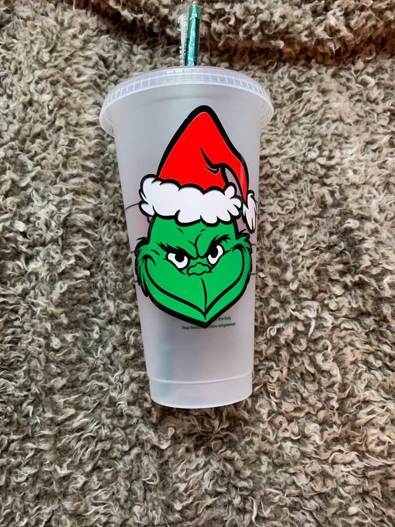 Merry Grinchmas Starbucks cup with grinch face