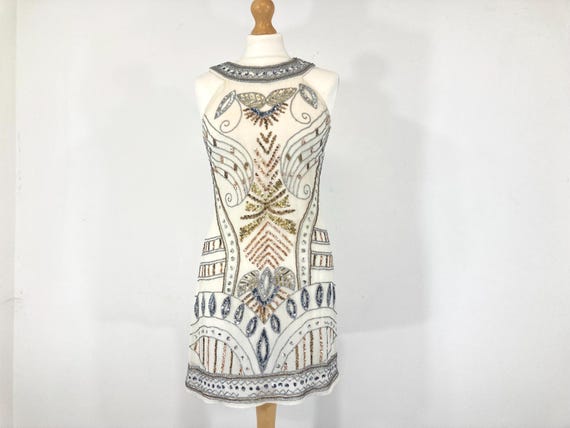 monsoon gold sequin dress Buy Monsoon Gold Samara Sequin Waterfall Bow Dress from Next USA
