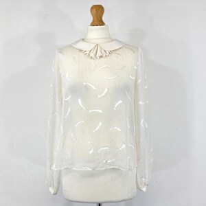 white sheer top with stars