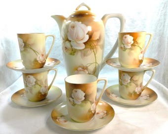 Antique RS Germany Chocolate Coffee Demitasse 12 Pcs Set Pot with 5 Cups & Saucers Hand Painted White Roses Brown Background Gold Trim
