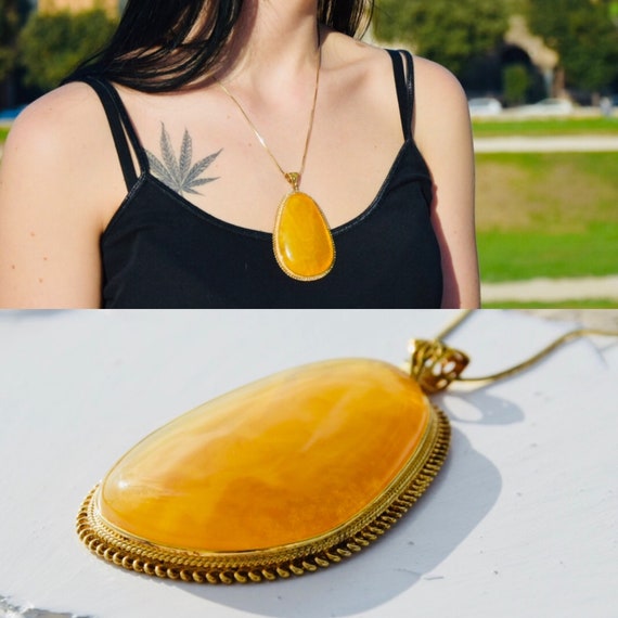Butterscotch amber pendant deals