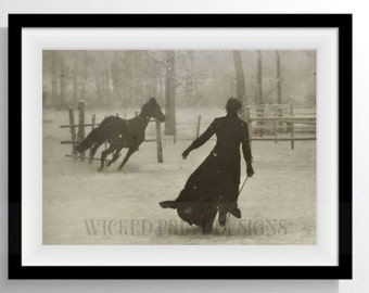 May include: A black and white photograph of a person in a long coat walking away from the camera in a snowy field. A horse is running towards the person in the distance.