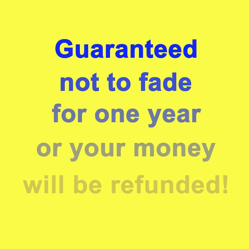 May include: A yellow background with blue and gray text that reads "Guaranteed not to fade for one year or your money will be refunded!"