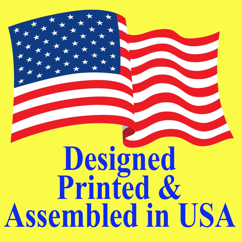 May include: An American flag waving in the wind with the text "Designed Printed & Assembled in USA" below it.