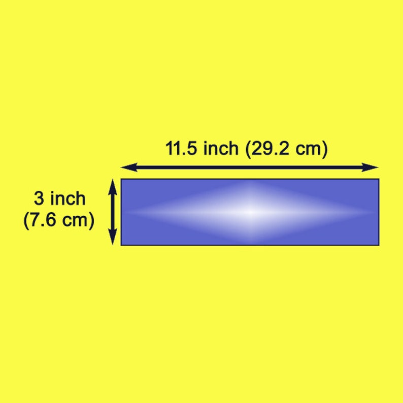 May include: A blue rectangular object with a white gradient in the center. The object is 11.5 inches (29.2 cm) wide and 3 inches (7.6 cm) tall.