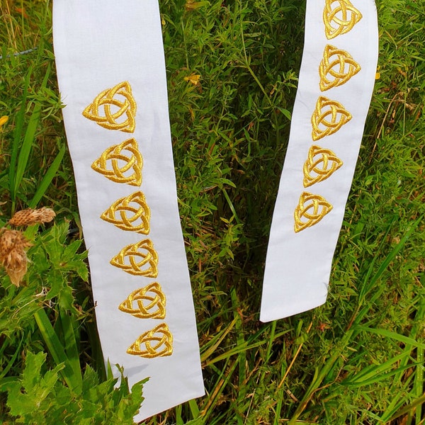 White cotton hand-fasting band with gold coloured triquetra celtic knot work embroidery