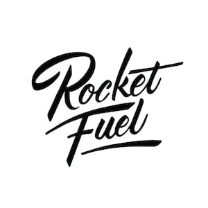May include: Black and white hand-drawn lettering that reads "Rocket Fuel".
