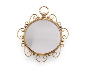 Antieke 9kt geelgouden medaillonhanger met open gezicht