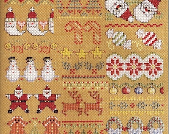 Op de afbeelding: Een kleurrijk borduurwerk met een kerstthema. Het bevat afbeeldingen van de kerstman, sneeuwpoppen, rendieren, snoepstokken, peperkoekmannetjes en kransen. Het borduurwerk is gestikt op een beige achtergrond en bevat de tekst "Joy, Joy, Joy".