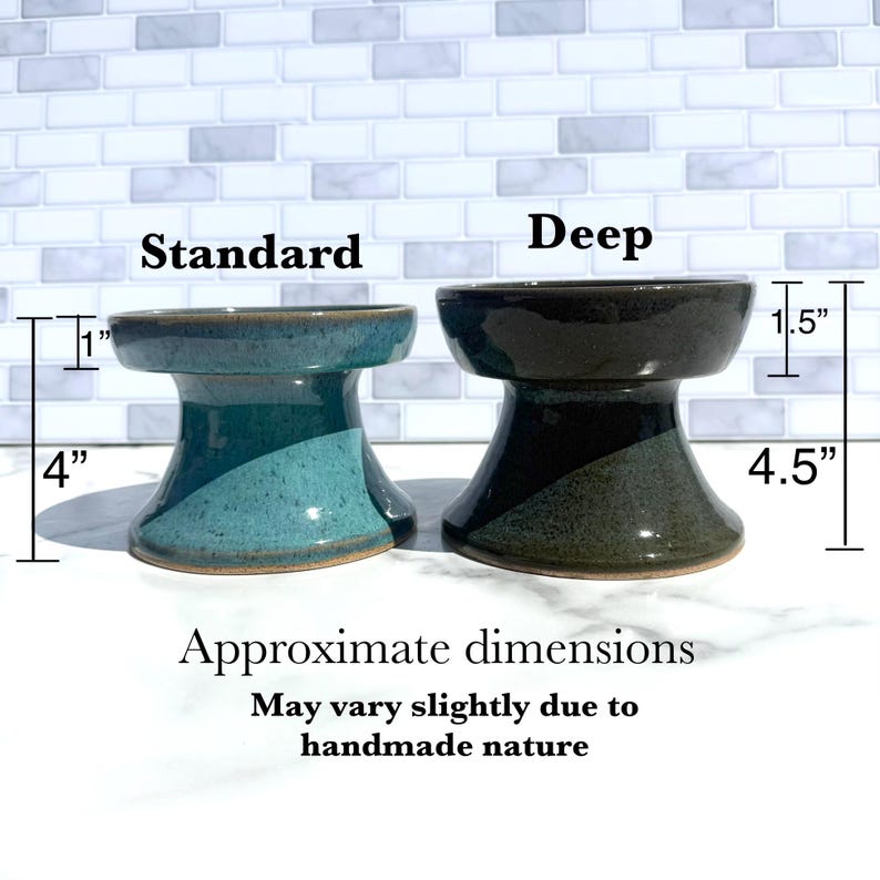 May include: Two ceramic bowls on pedestals. The left bowl is teal, labeled Standard, with a 1-inch depth and 4-inch height. The right bowl is dark green, labeled Deep, with a 1.5-inch depth and 4.5-inch height. Text reads Approximate dimensions.